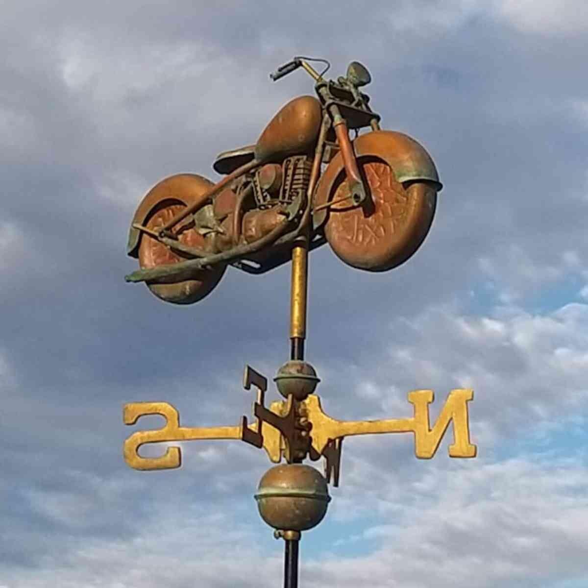 Medium aged copper motorcycle weathervane
