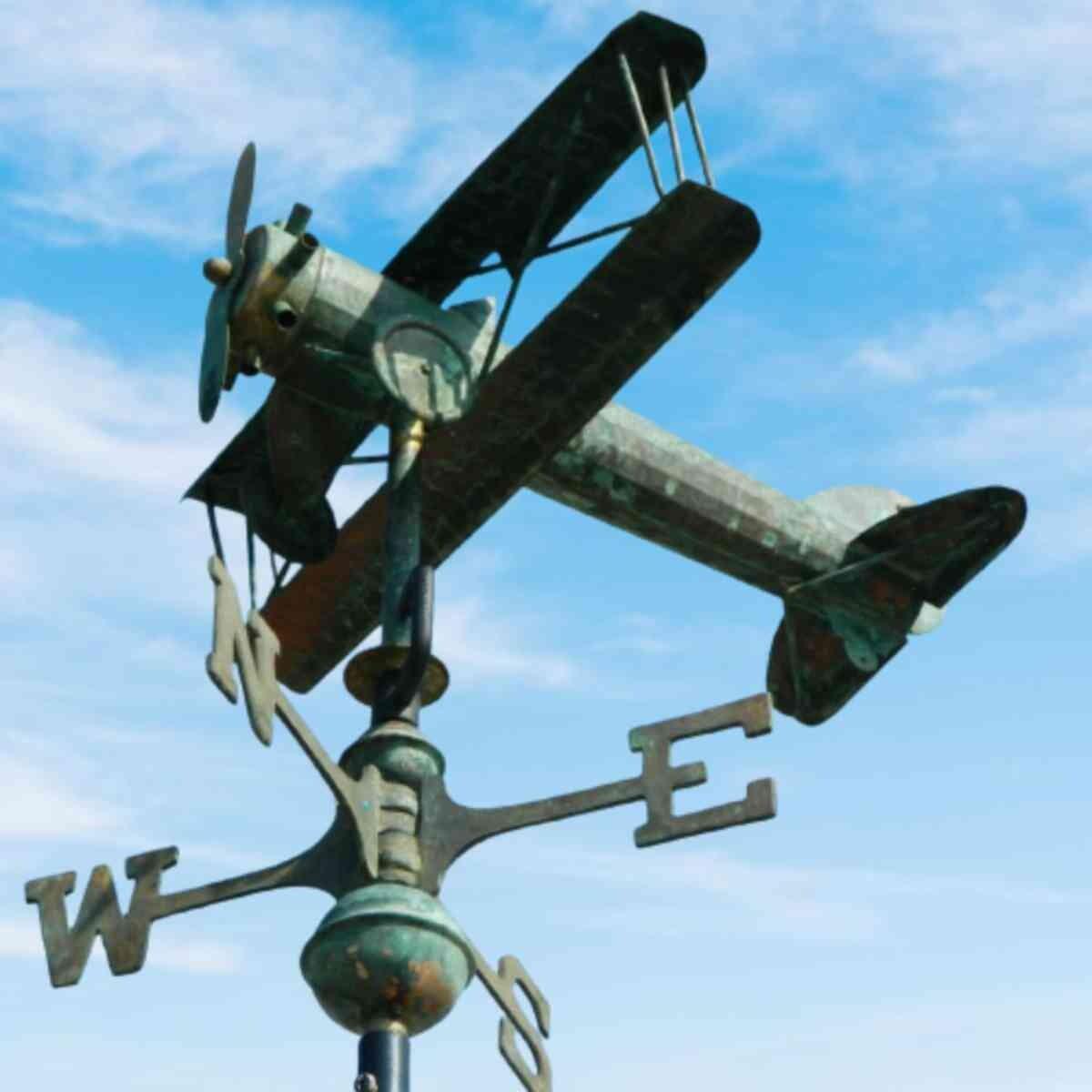 Medium hand crafted copper aged verdigris biplane weathervane