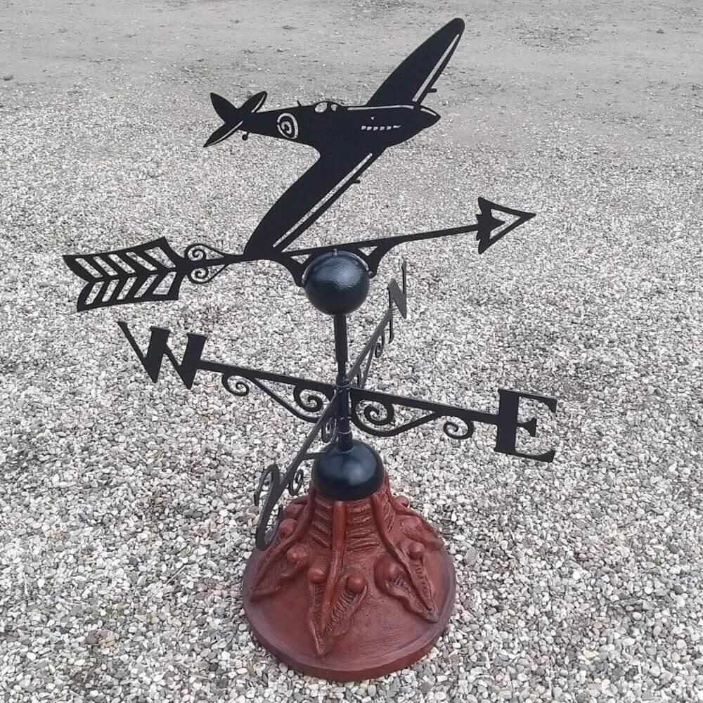 Spitfire steel weathervane installed on a round ridge tile cap