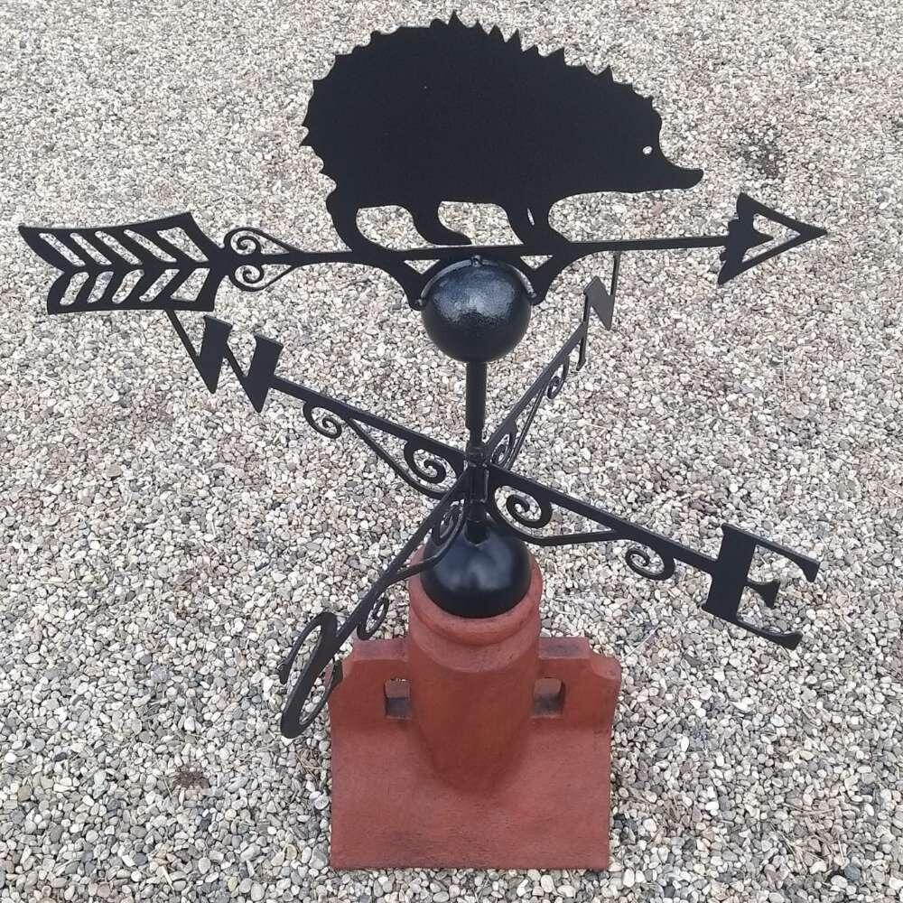 Hedgehog weathervane fitted on a 45 degree ridge tile finial