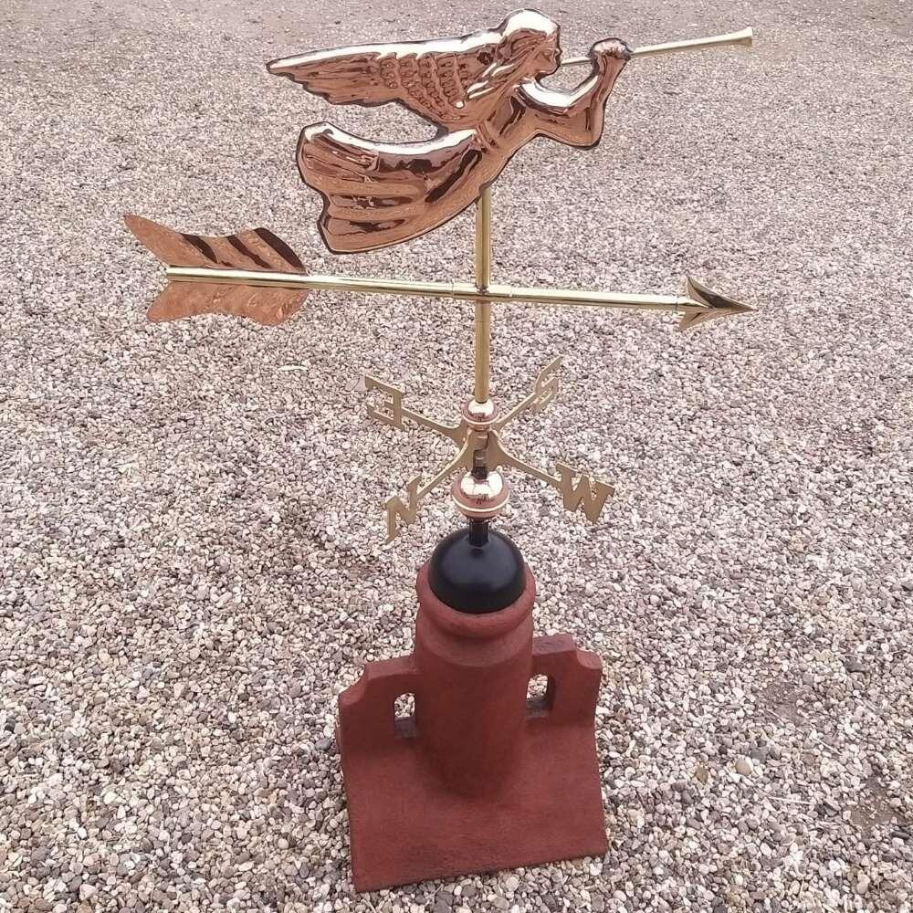 Angel weathervane fitted on a double arch angled 45 degree ridge tile finial