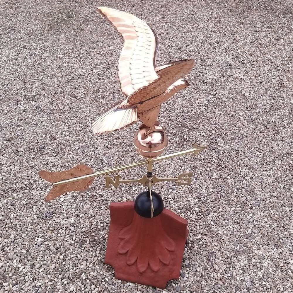 Eagle weathervane supplied on a ridge tile finial fitting with multiple angle options