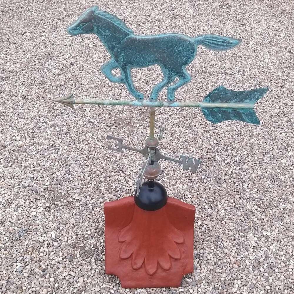 Horse verdigris weathervane fitted on a ridge tile finial fitting with multiple angle options