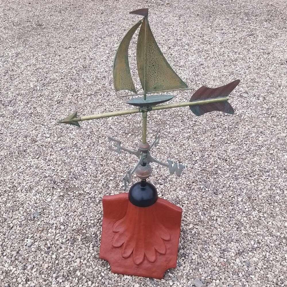 Sailboat verdigris weathervane on a ridge tile finial fitting with multiple angle options