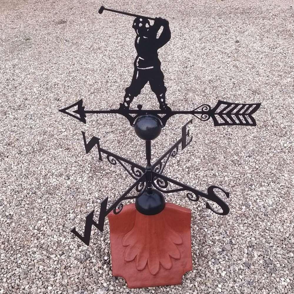 Golfer weathervane on a ridge tile finial fitting with multiple angle options