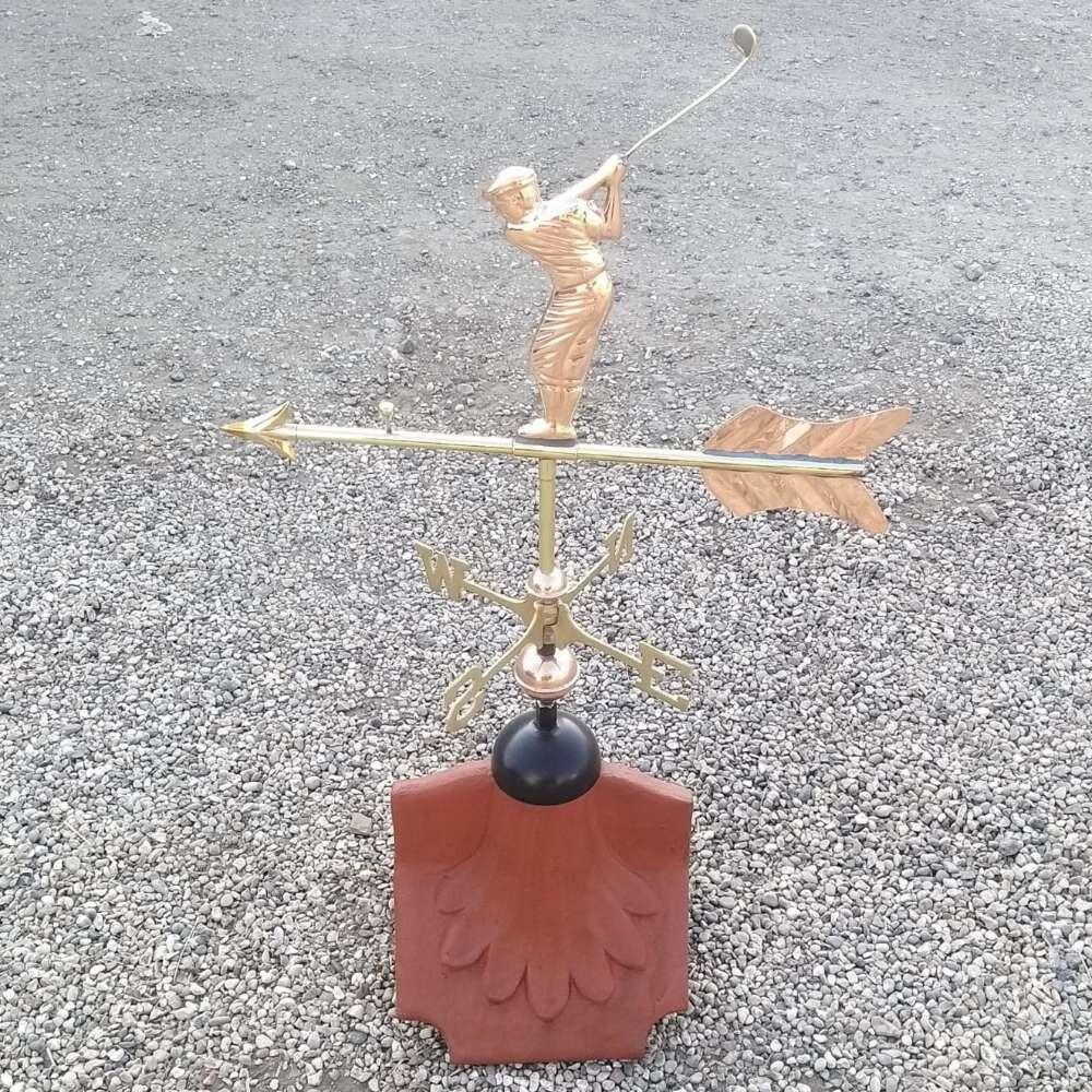 Golfer weathervane mounted on a ridge tile finial fitting with multiple angle options