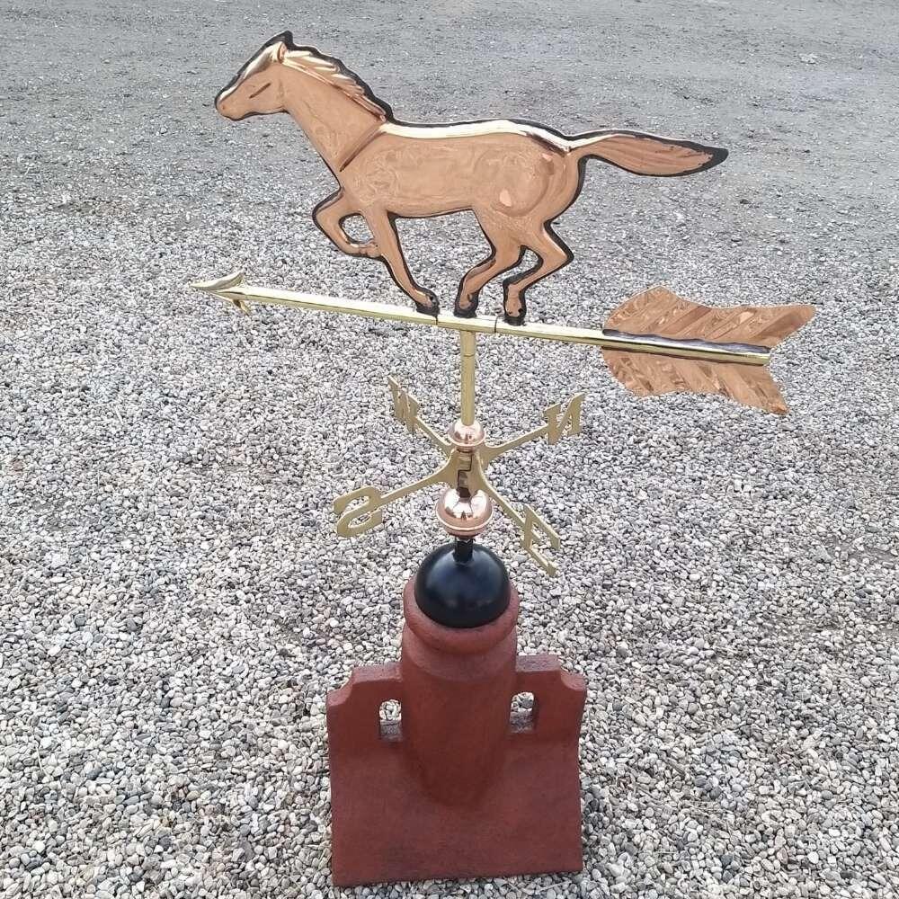 Horse weathervane mounted on a 45 degree ridge tile finial