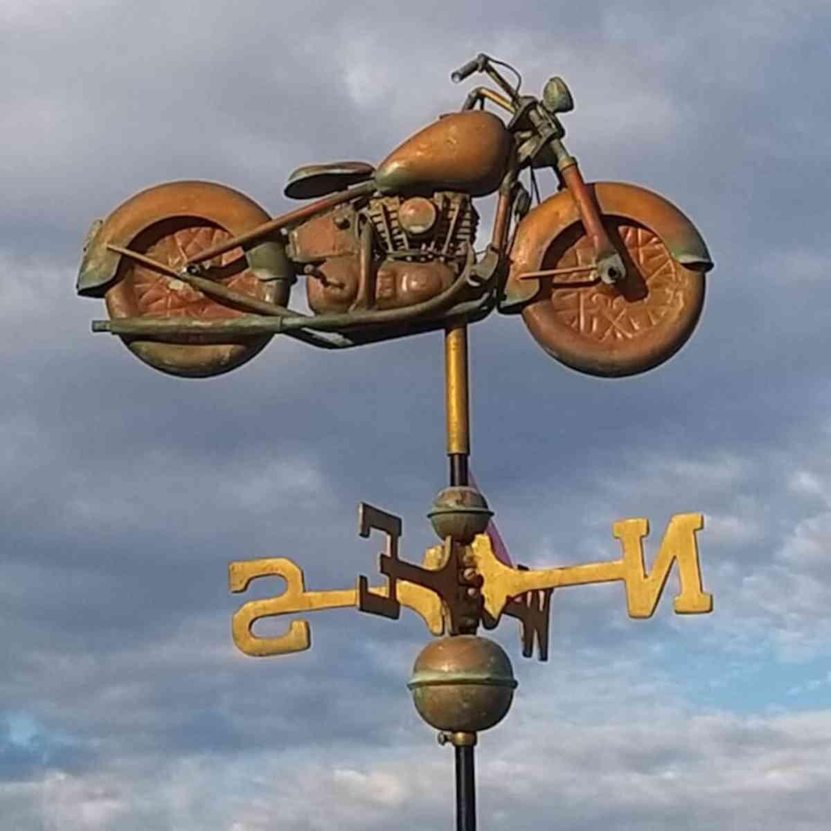 Medium aged copper motorcycle weathervane