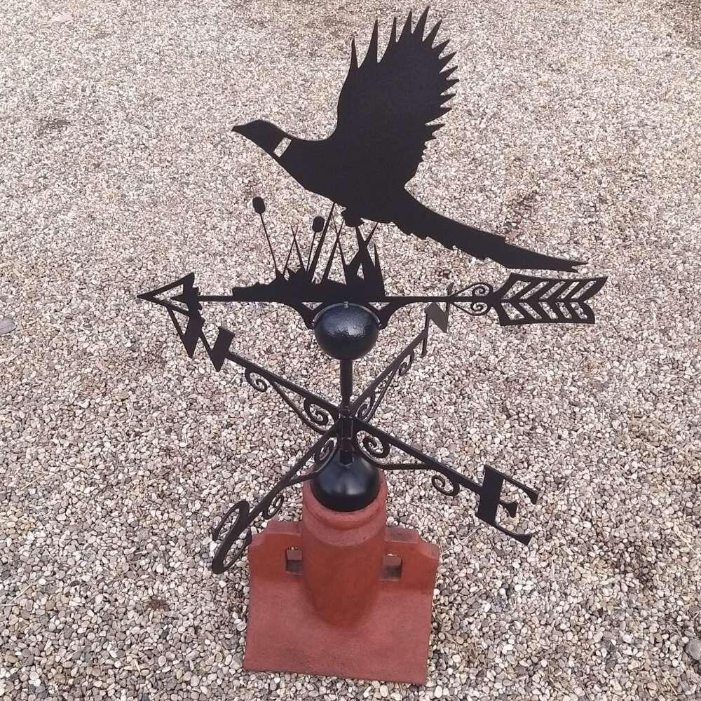 Pheasant weathervane installed on a 45 degree ridge tile finial