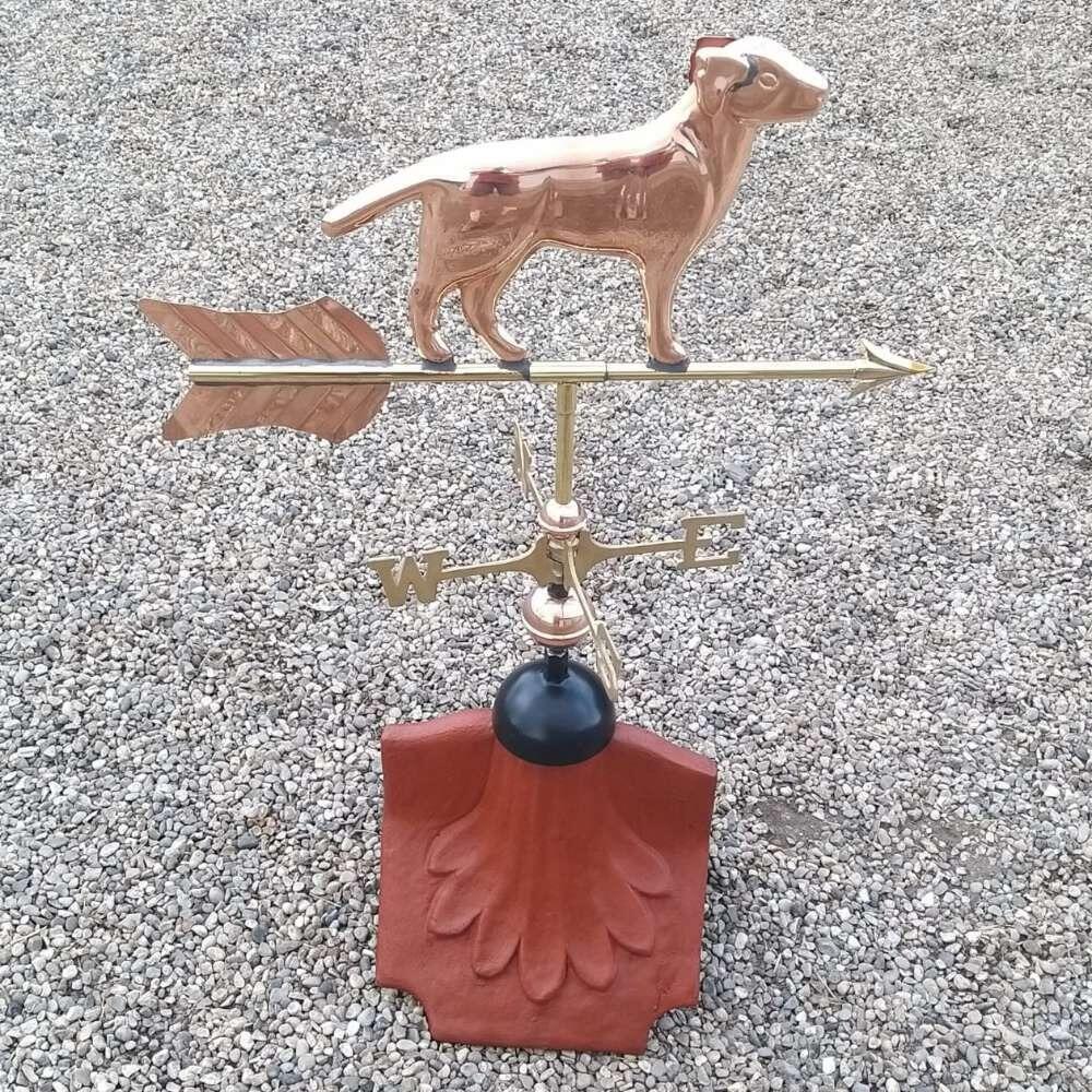 Dog weathervane supplied on a ridge tile finial fitting with multiple angle options