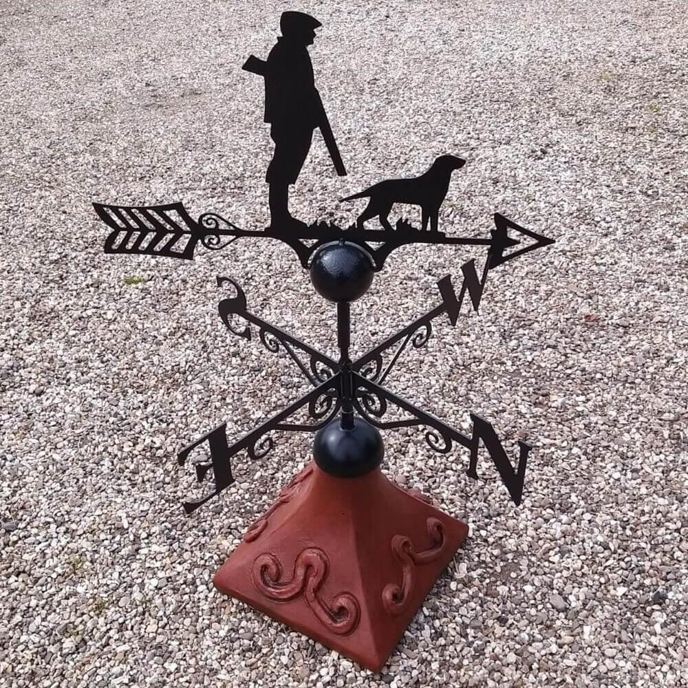 Gun down hunting weathervane supplied on a square ridge tile
