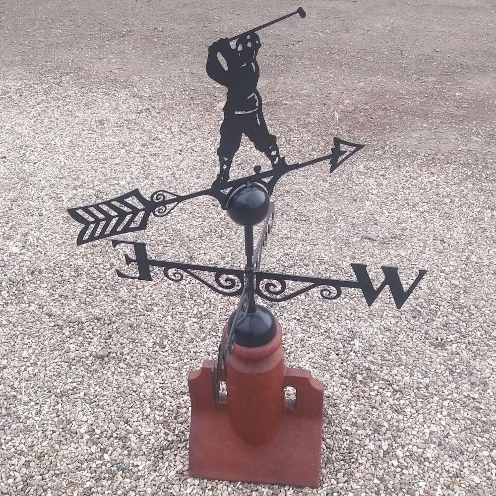 Golfer weathervane supplied on a 45 degree ridge tile finial