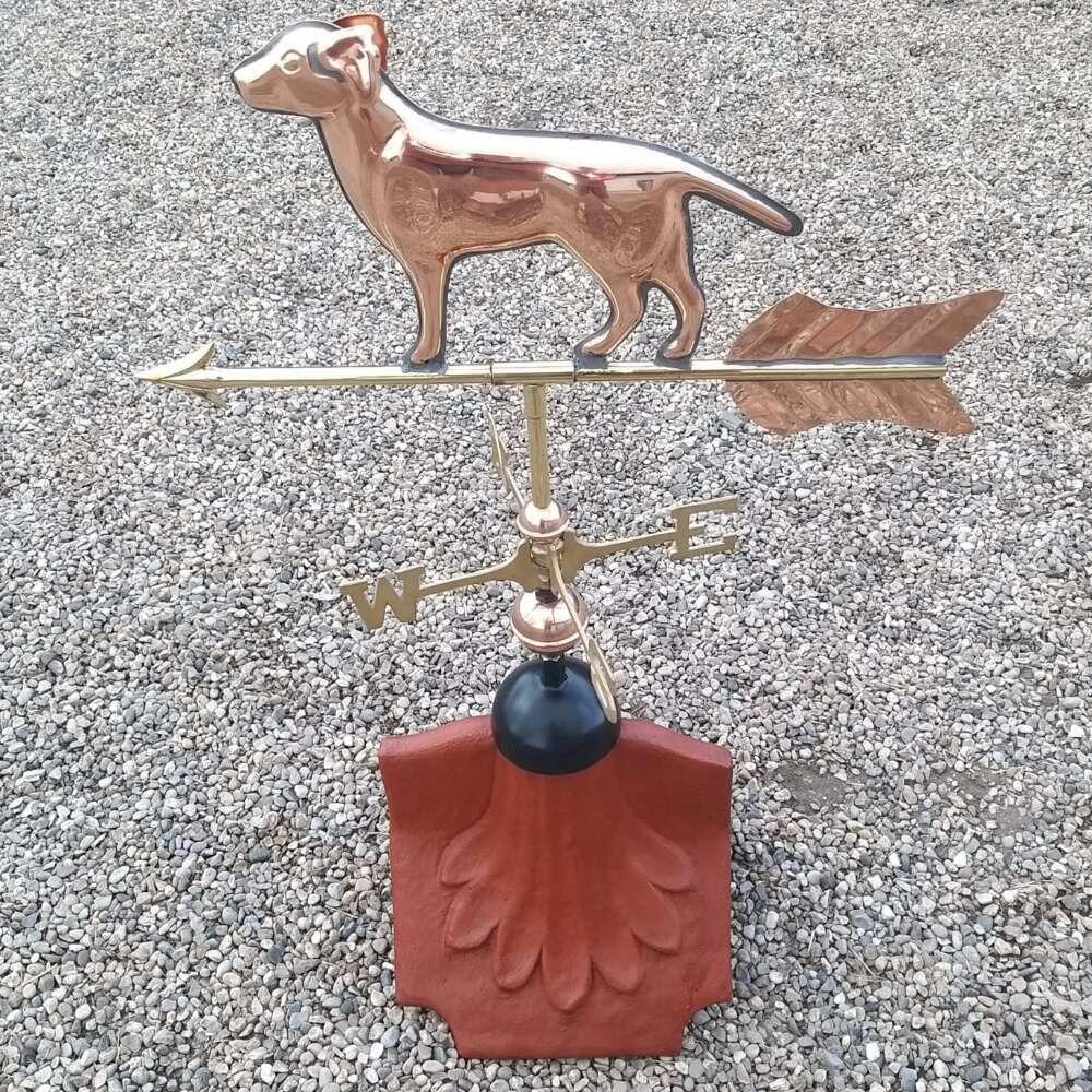 Dog weathervane supplied on a ridge tile finial fitting with multiple angle options