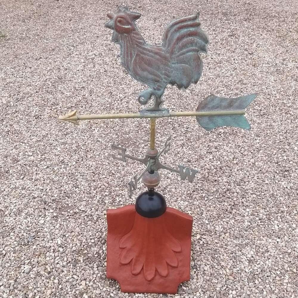 Cockerel verdigris weathervane supplied on a ridge tile finial fitting with multiple angle options