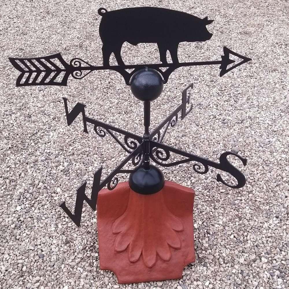 Pig weathervane on a ridge tile finial fitting with multiple angle options