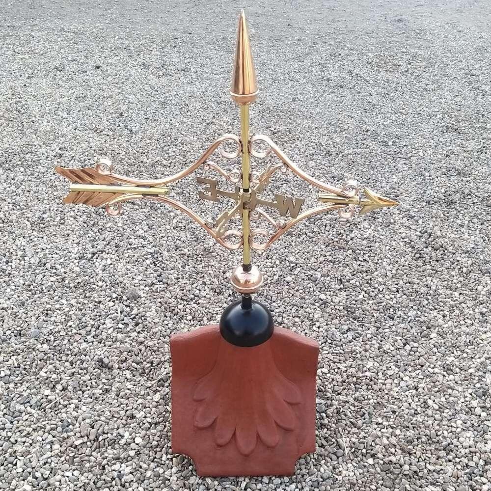 Victorian arrow weathervane installed on a ridge tile finial fitting with multiple angle options