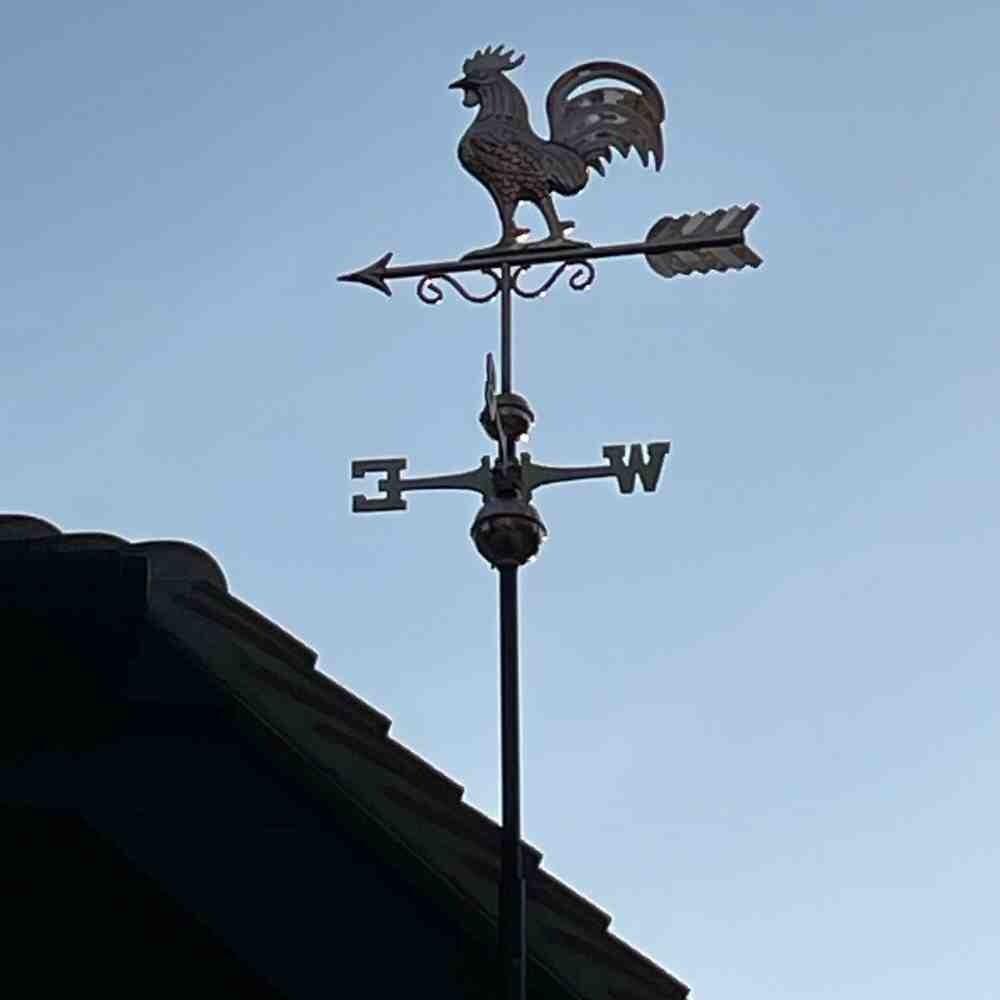 Copper Bantam Rooster Weathervane on a Gable End