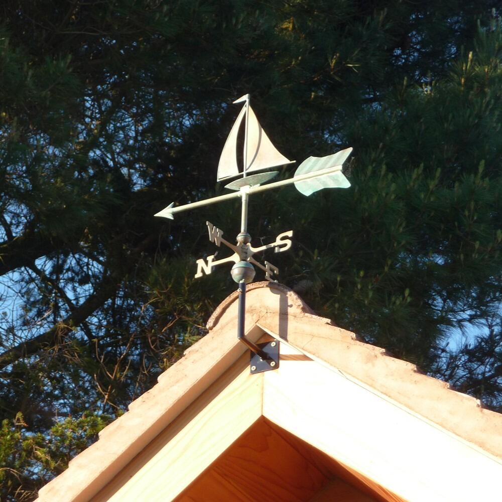 Verdigris Sailboat Weathervane on a Cottage Gable End