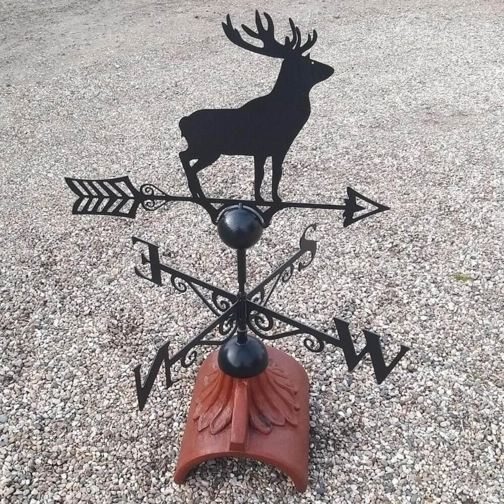 Stag weathervane fixed to a half round ridge tile