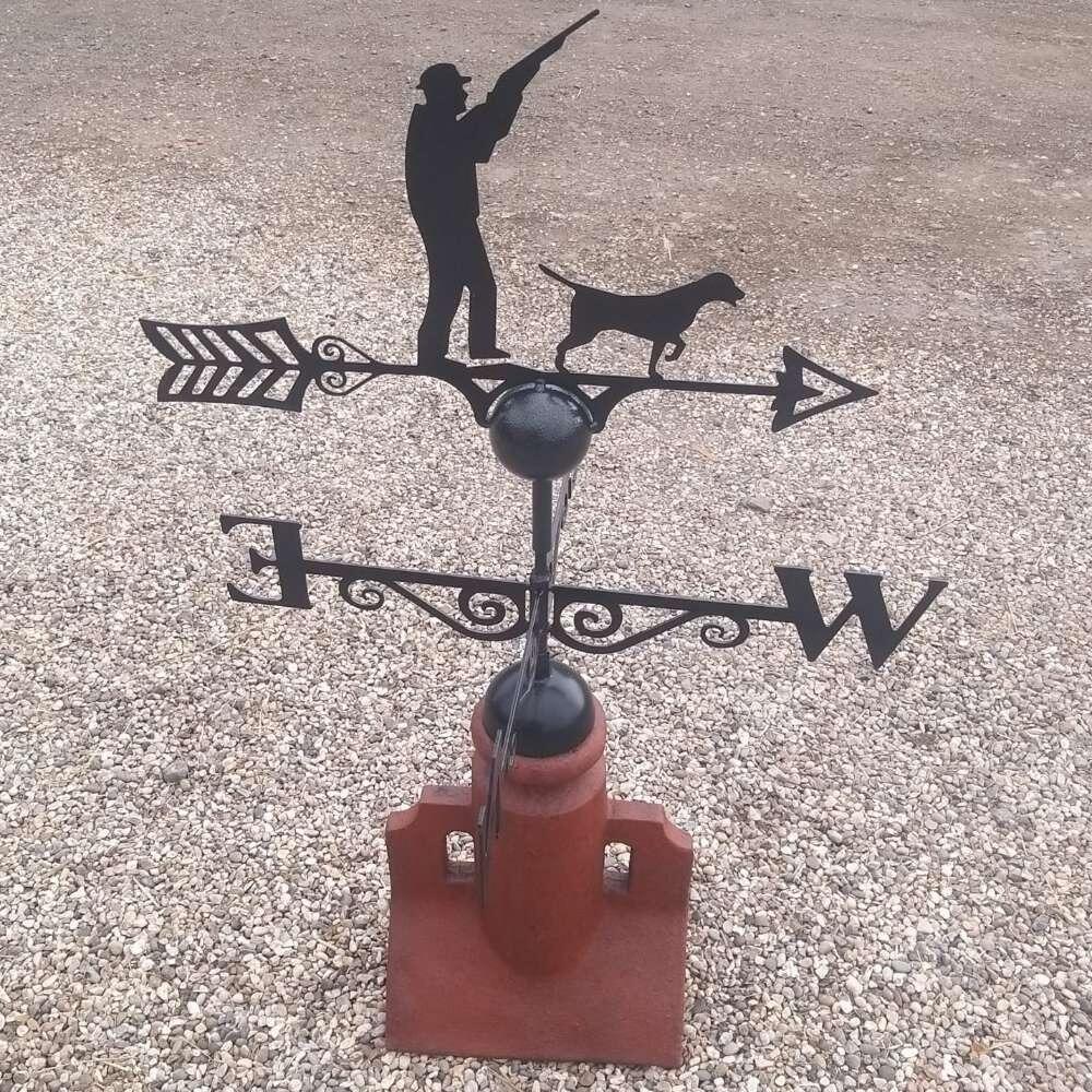 Hunting weathervane fitted on a 45 degree ridge tile finial