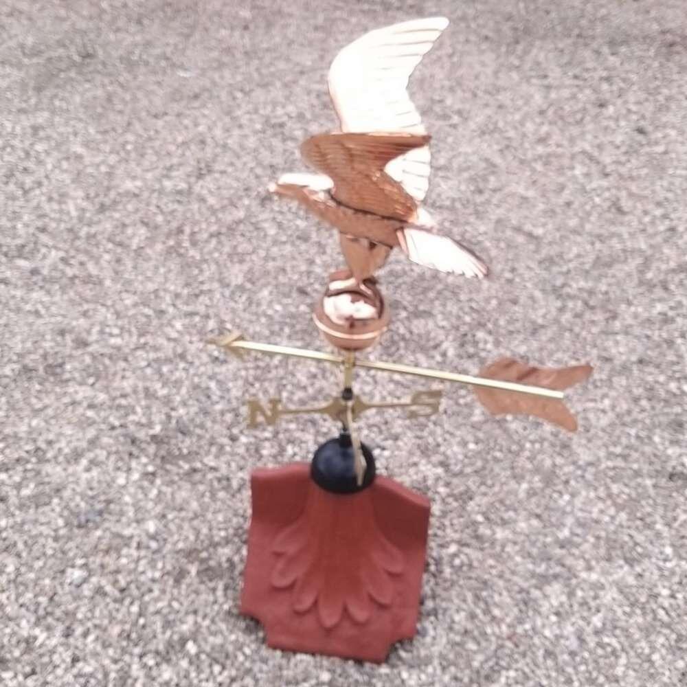 Eagle weathervane supplied on a ridge tile finial fitting with multiple angle options