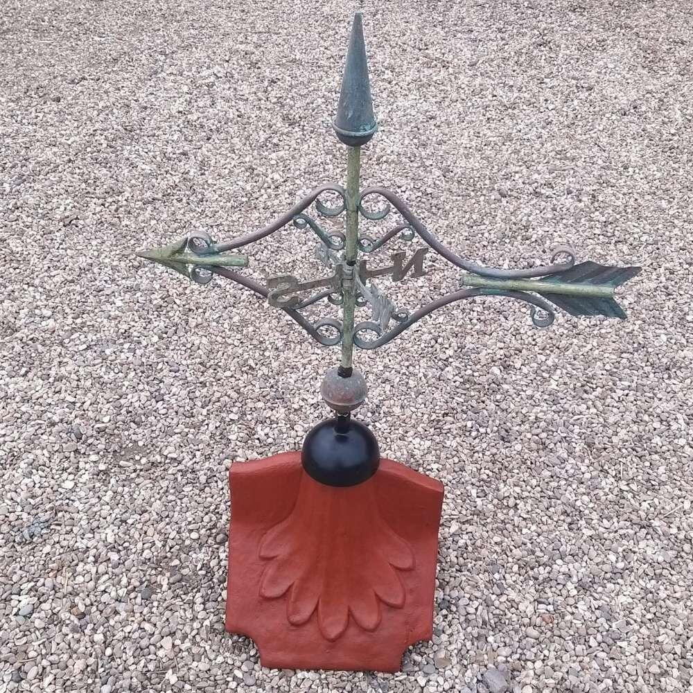 Victorian verdigris arrow weathervane on a ridge tile finial fitting with multiple angle options