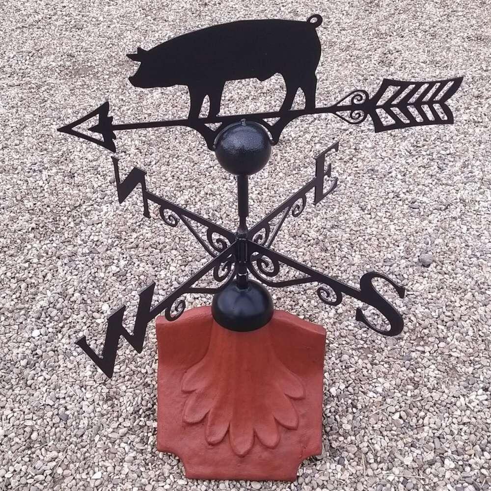 Pig weathervane on a ridge tile finial fitting with multiple angle options
