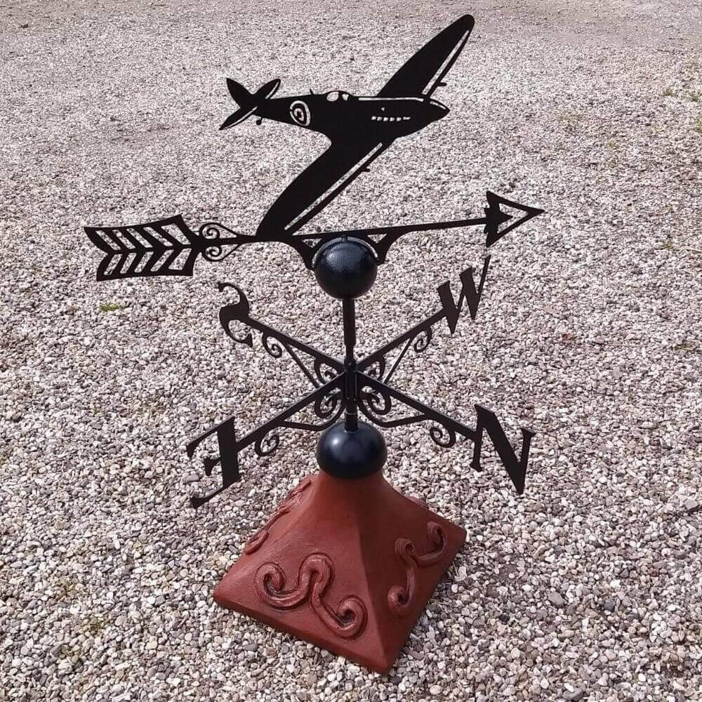 Spitfire weathervane fitted to a square ridge tile cap