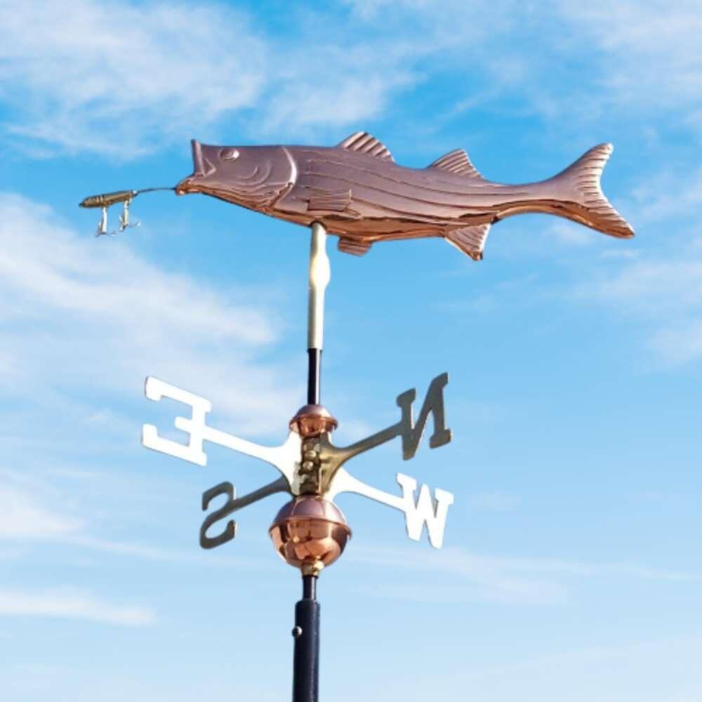 Fish copper weathervane installed on a 45 degree ridge finial