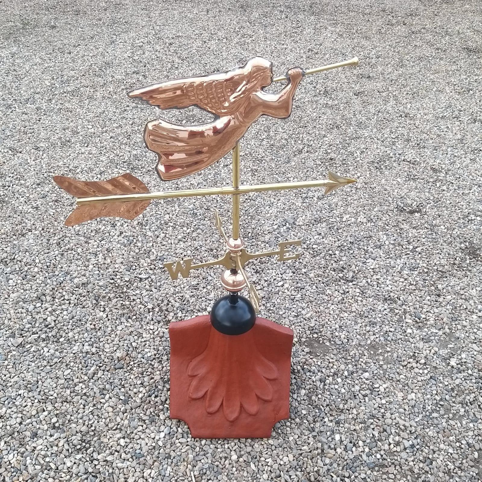 Angel weathervane fitted on a ridge tile finial fitting with multiple angle options