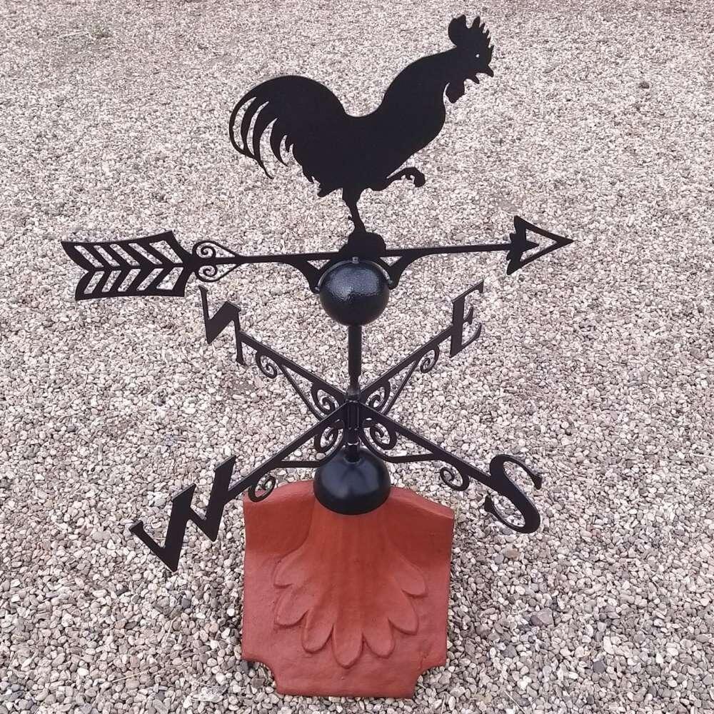 Cockerel weathervane on a ridge tile finial fitting with multiple angle options