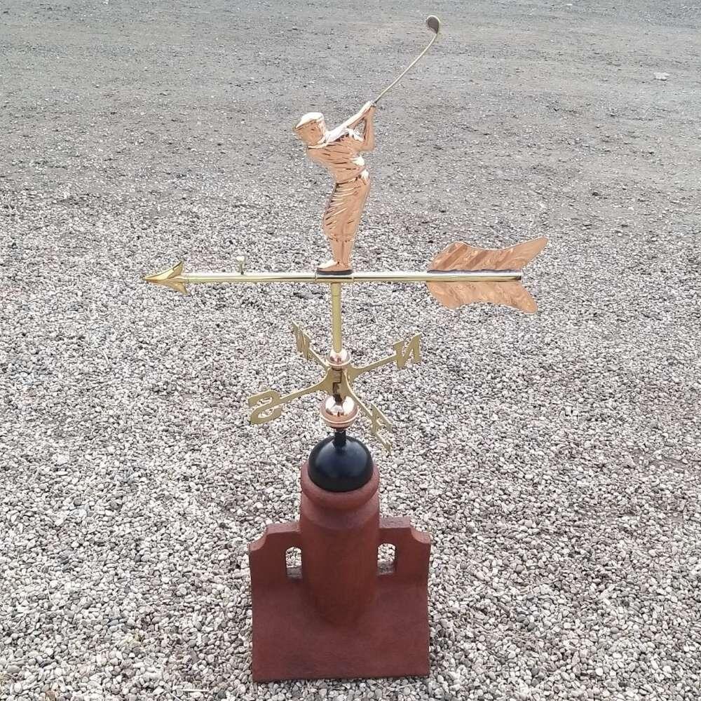 Golfer weathervane mounted on a 90 degree ridge tile finial