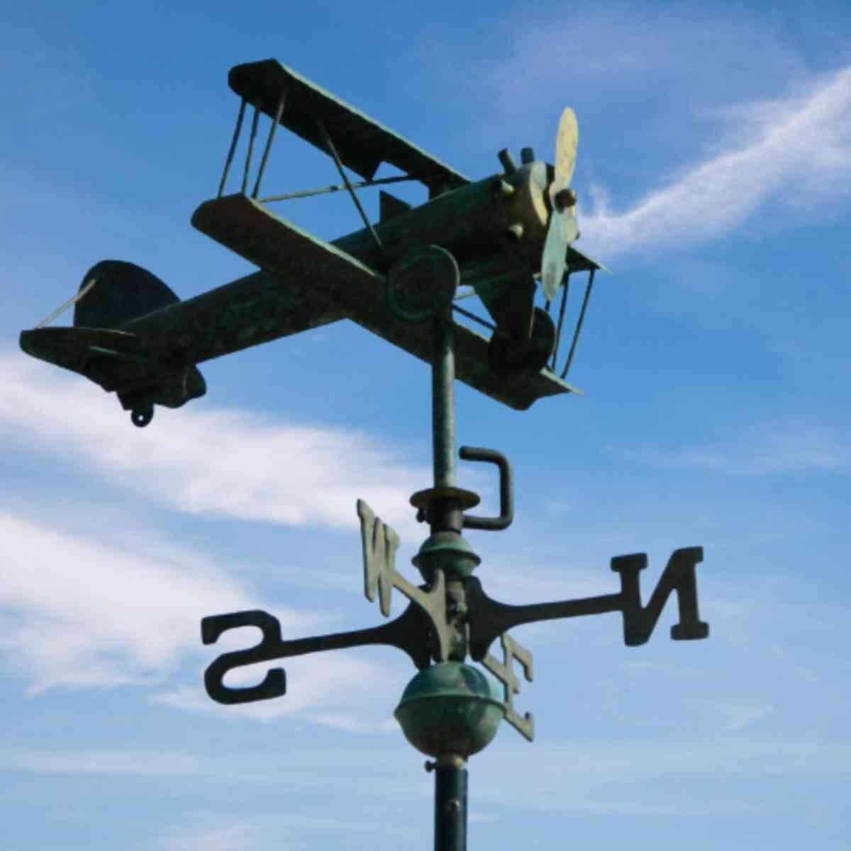 Medium hand crafted copper aged verdigris biplane weathervane