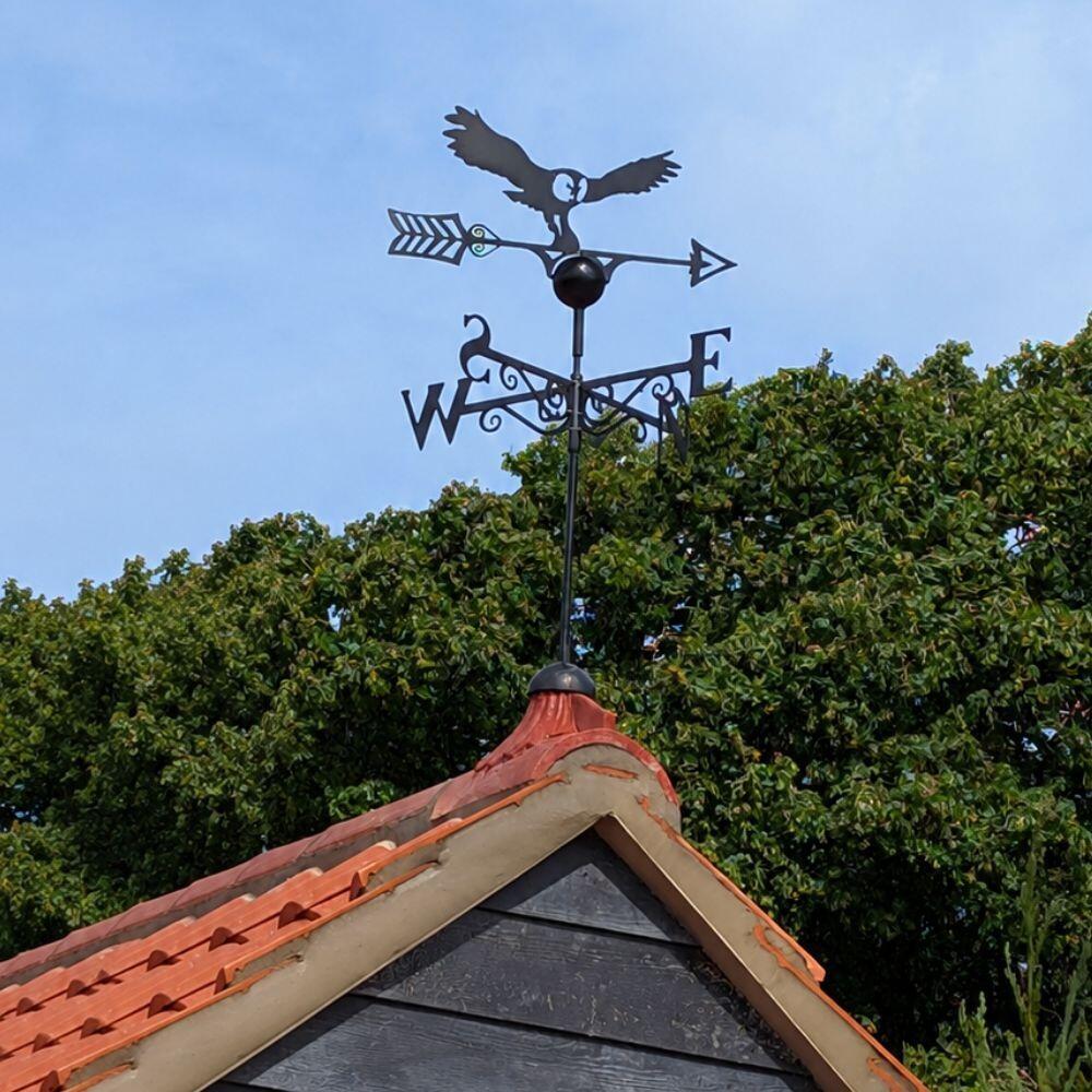 Owl weathervane supplied on a half round roof tile finial