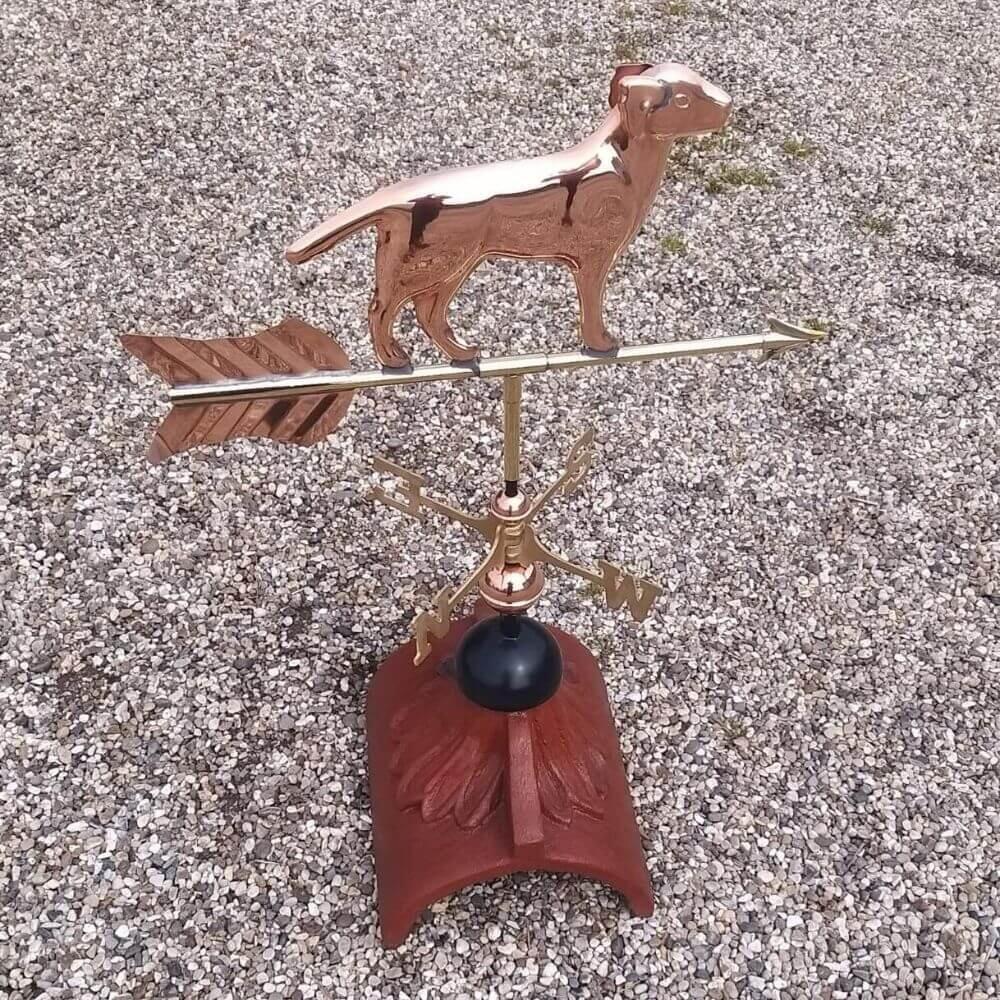 Labrador weathervane fixed to a half round roof finial