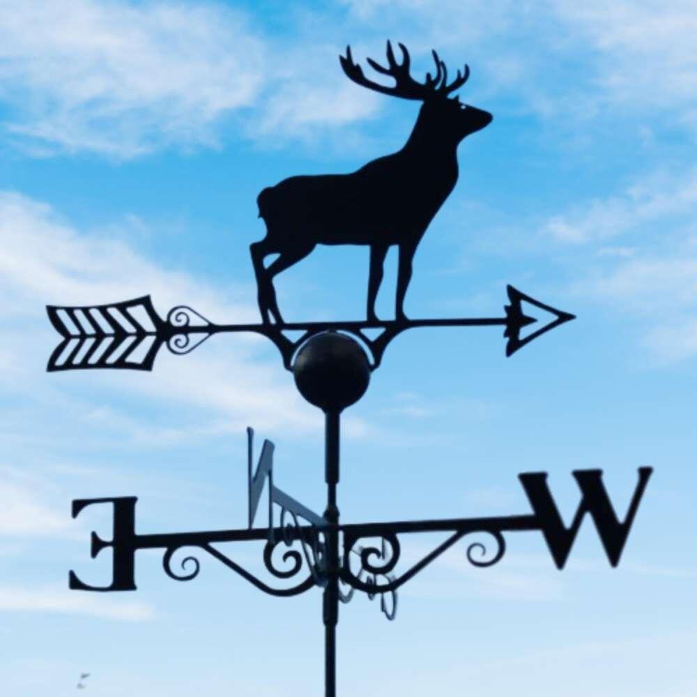 Stag weathervane fixed on a square roof tile capping finial