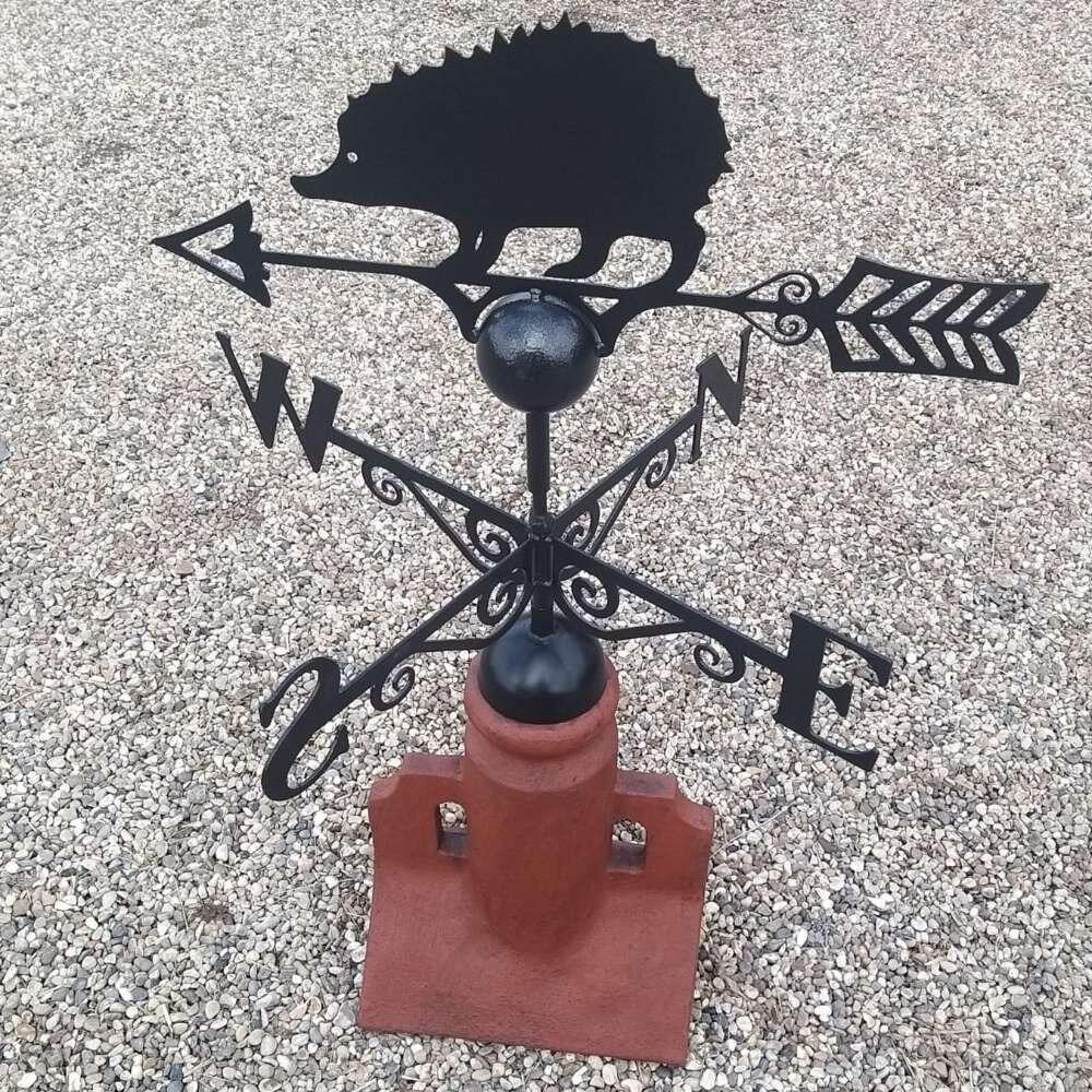Hedgehog weathervane fitted on a 45 degree ridge tile finial