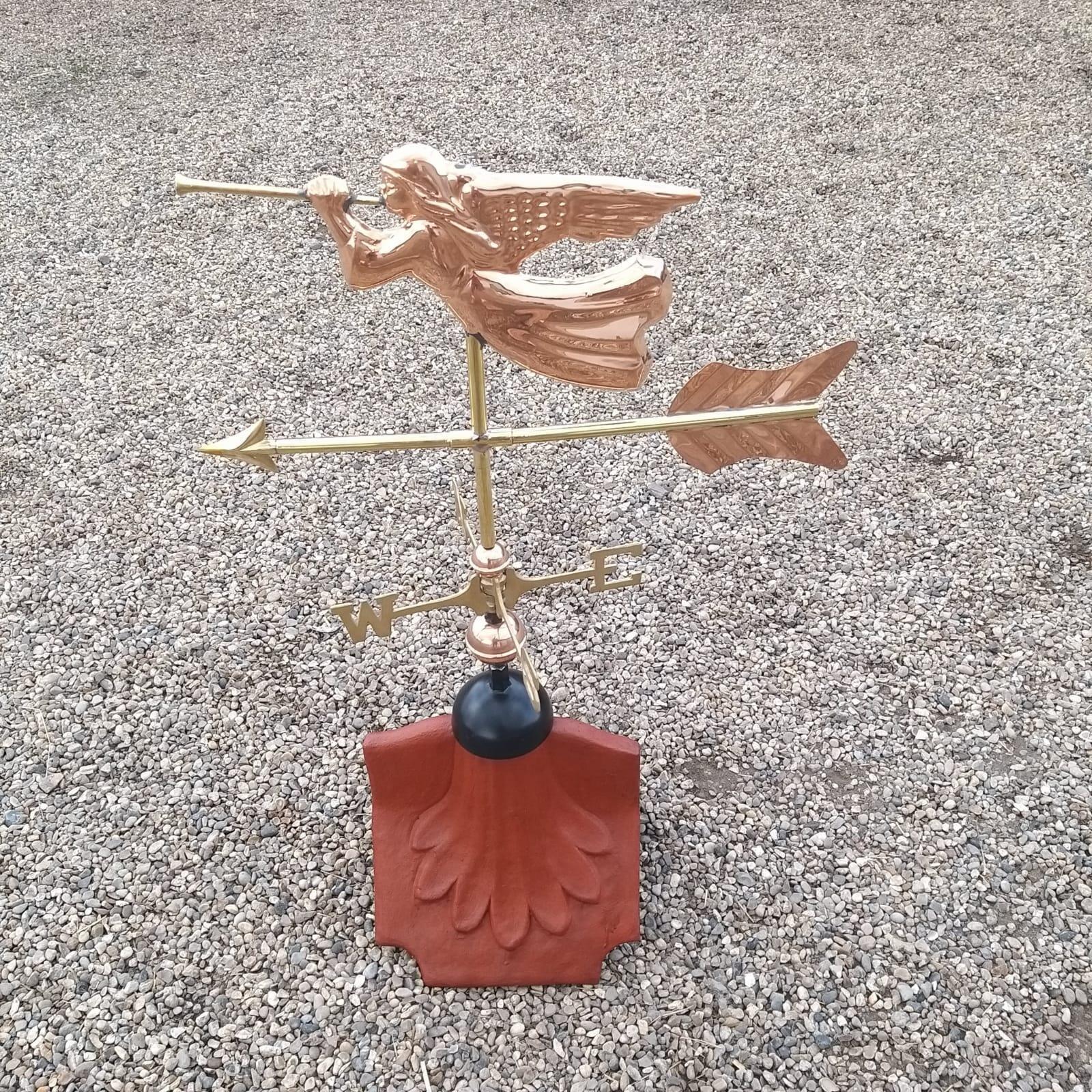 Angel weathervane fitted on a ridge tile finial fitting with multiple angle options