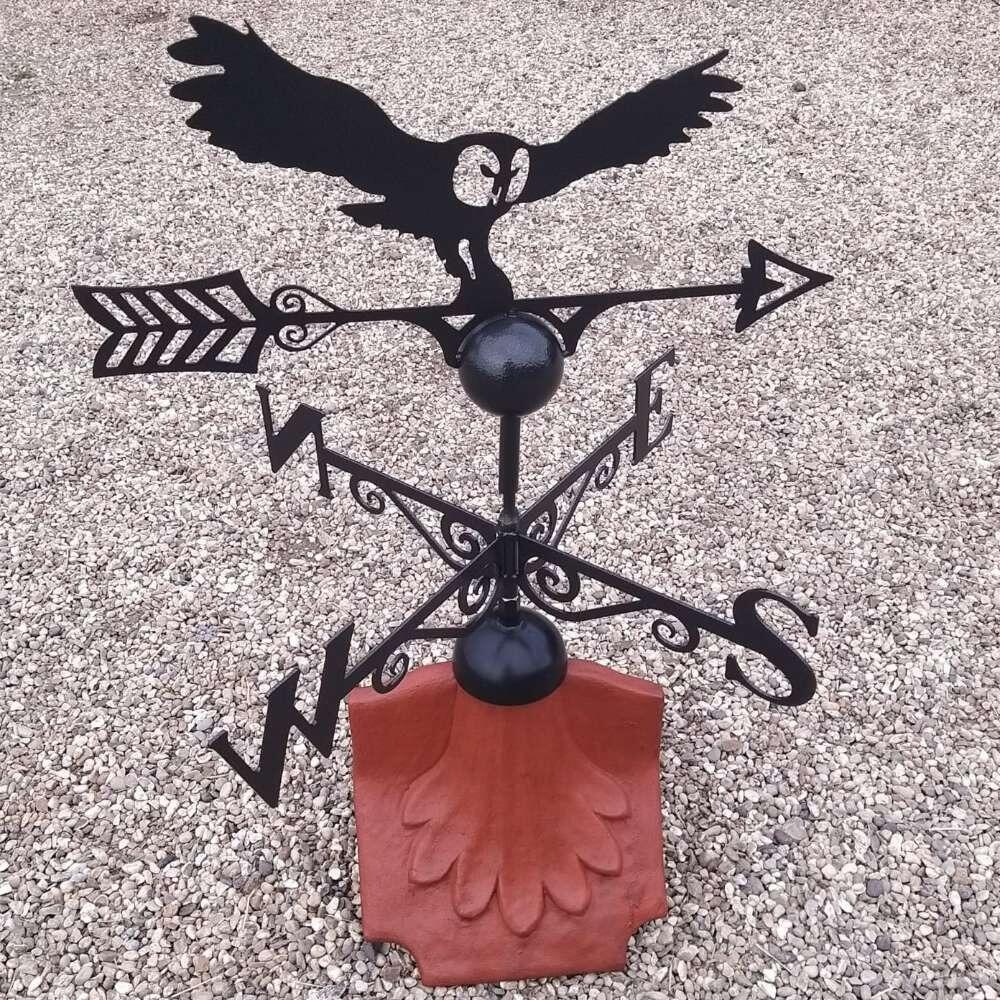 Owl weathervane on a ridge tile finial fitting with multiple angle options