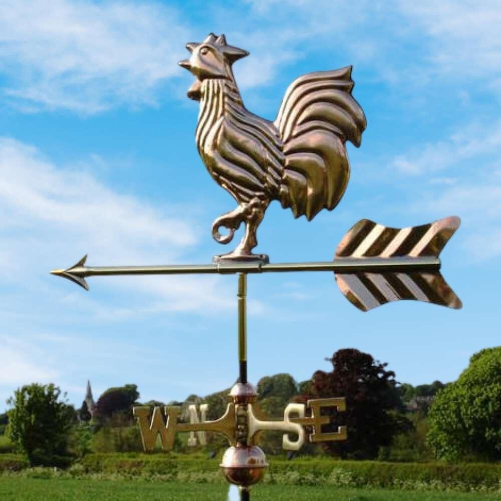 Cockerel weathervane fitted on a ridge tile finial fitting with multiple angle options
