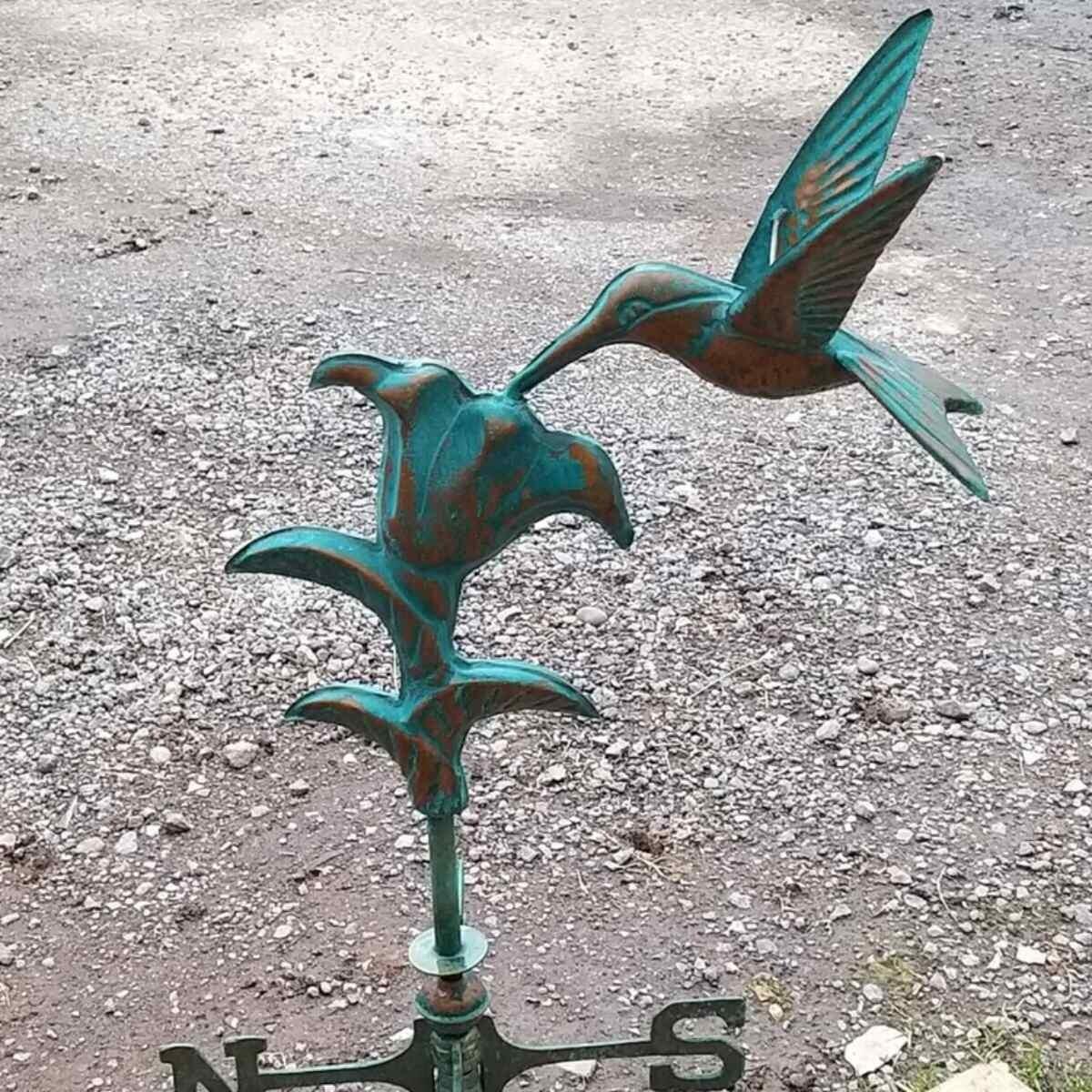 Medium aged copper hummingbird weathervane