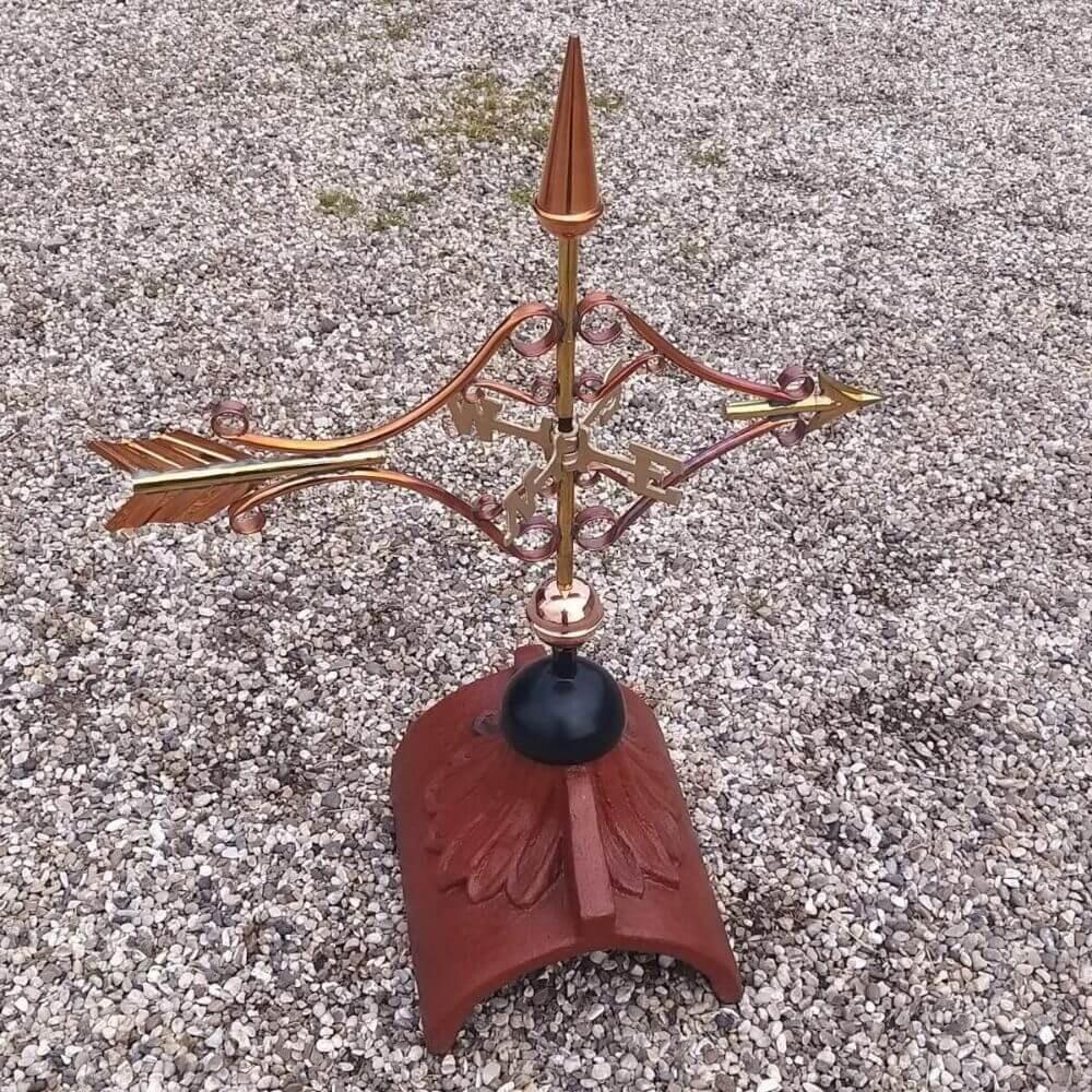 Victorian copper arrow weathervane fitted on a half round ridge