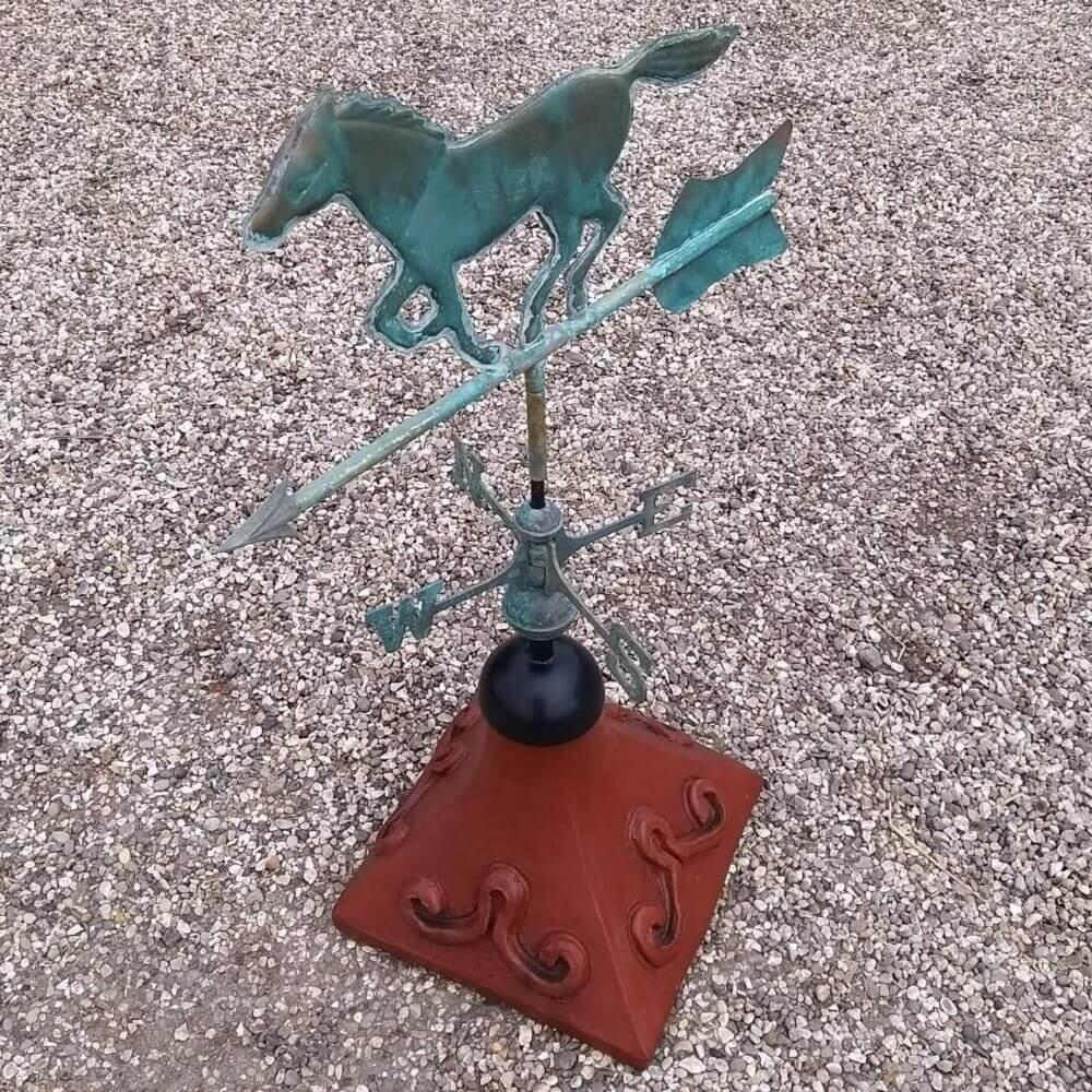 Horse weathervane fitted to a square roof tile capping