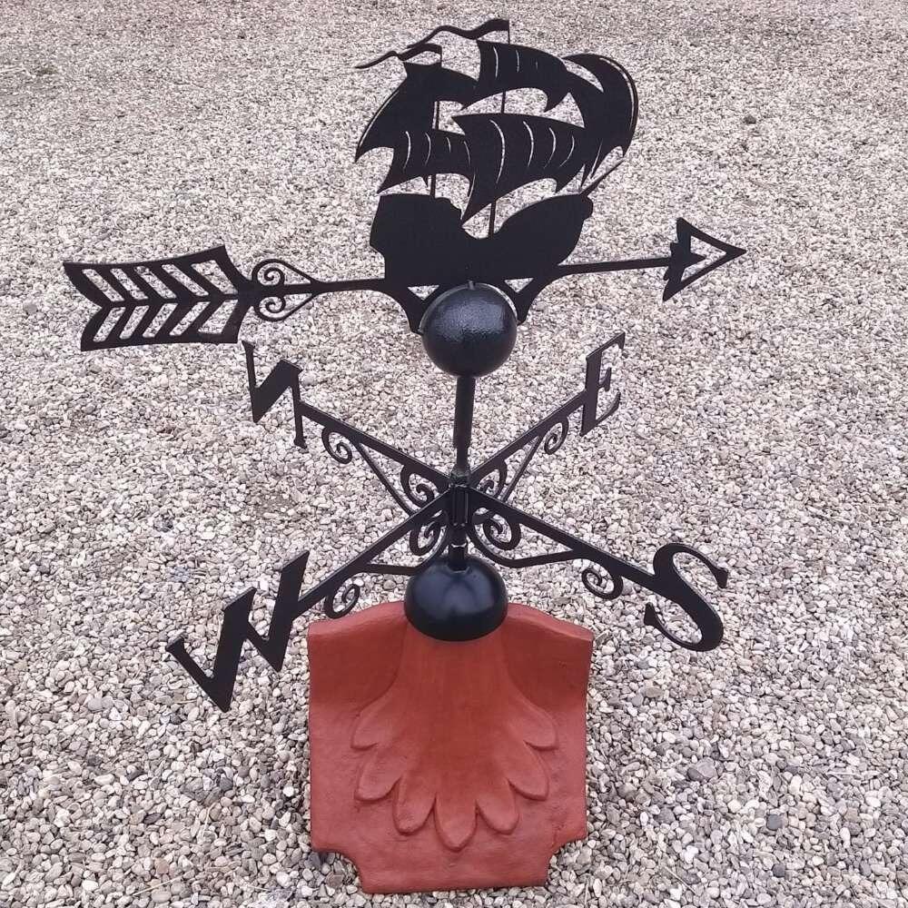 Pirate boat weathervane on a ridge tile finial fitting with multiple angle options