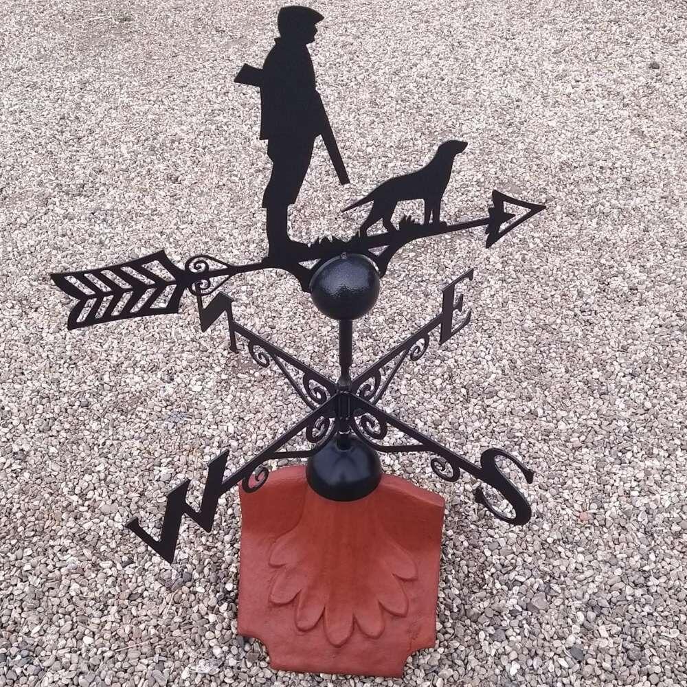 Hunting gun down weathervane on a ridge tile finial fitting with multiple angle options