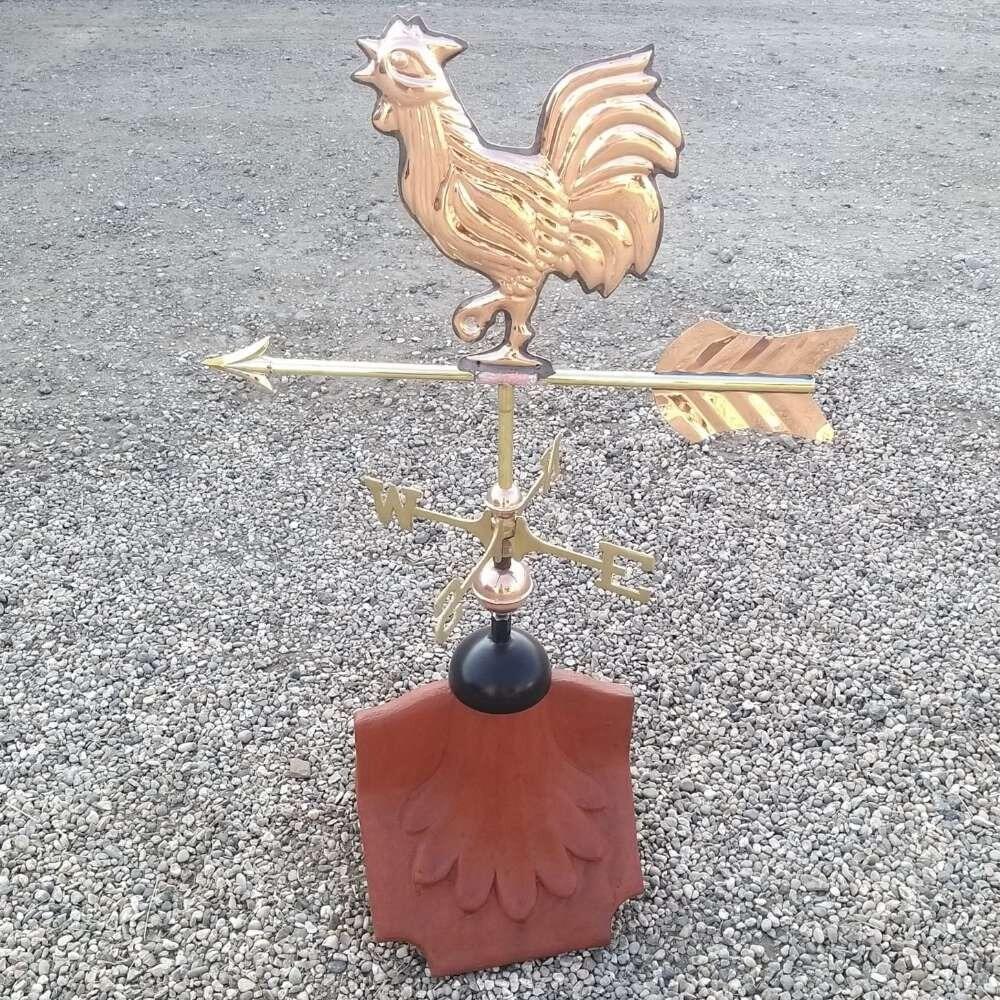 Cockerel weathervane fitted on a ridge tile finial fitting with multiple angle options