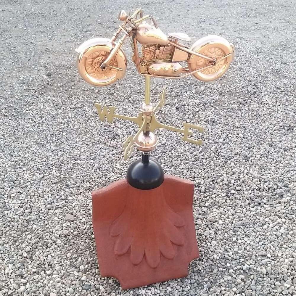 Motorbike weathervane installed on a ridge tile finial fitting with multiple angle options