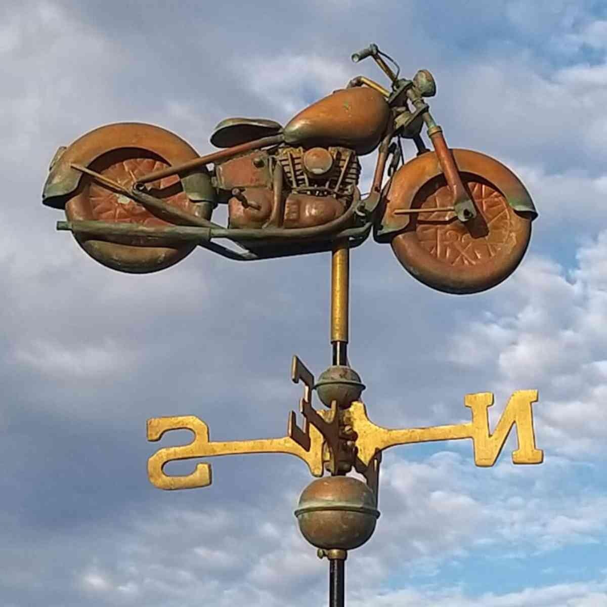 Medium aged copper motorcycle weathervane