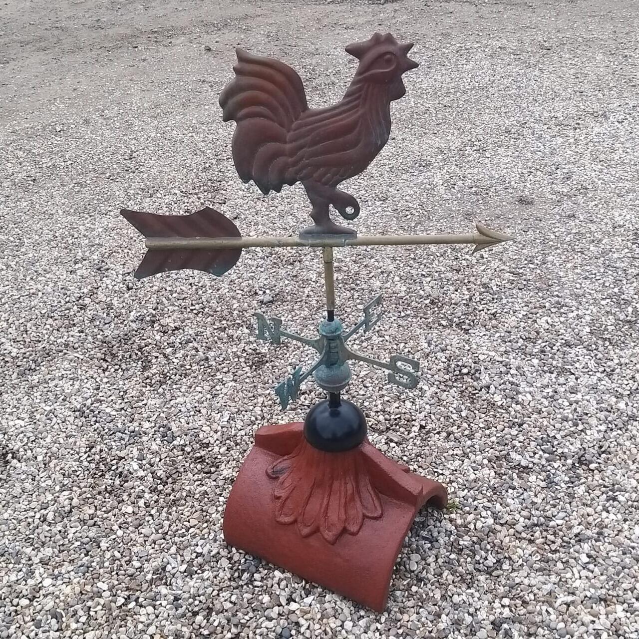 Cockerel weathervane fitted to a half round ridge