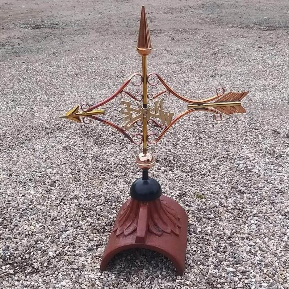Victorian arrow copper weathervane fitted on a half round ridge